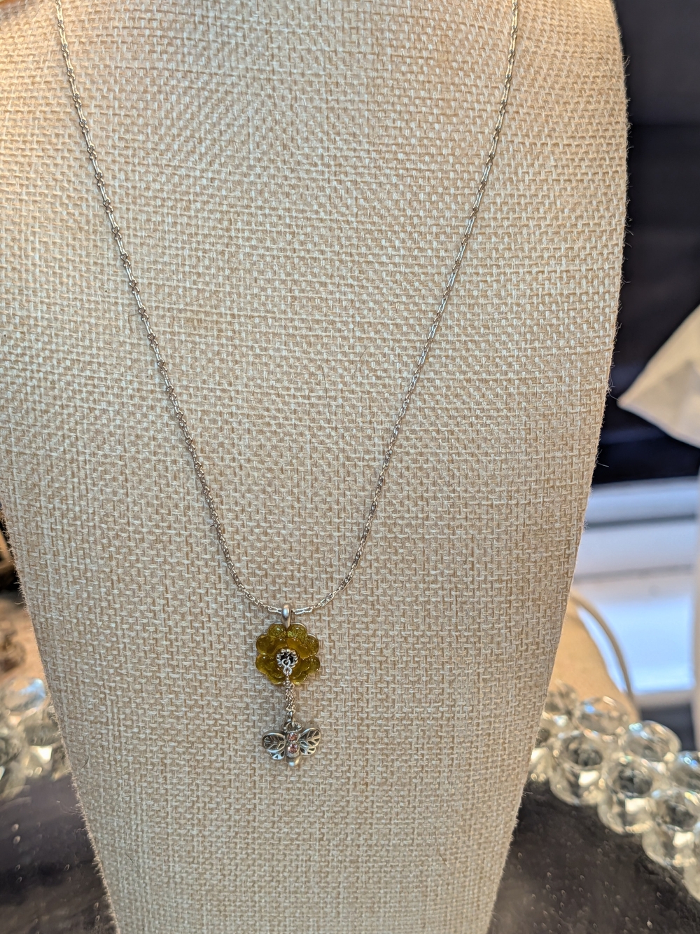 Nina Ricci Rhodium Plated Necklace with Yellow Flower and Butterfly Pendant NWT